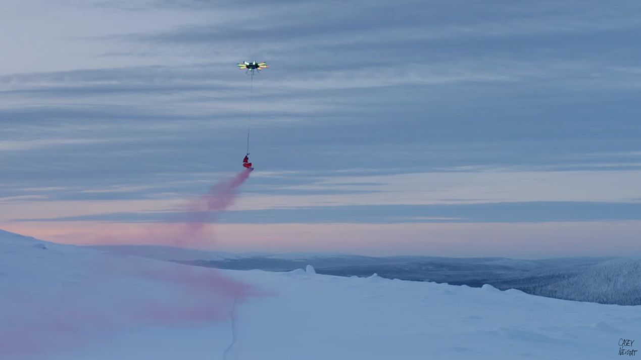 Drone Carrying Snowboarder Over Finland's Santa's Village