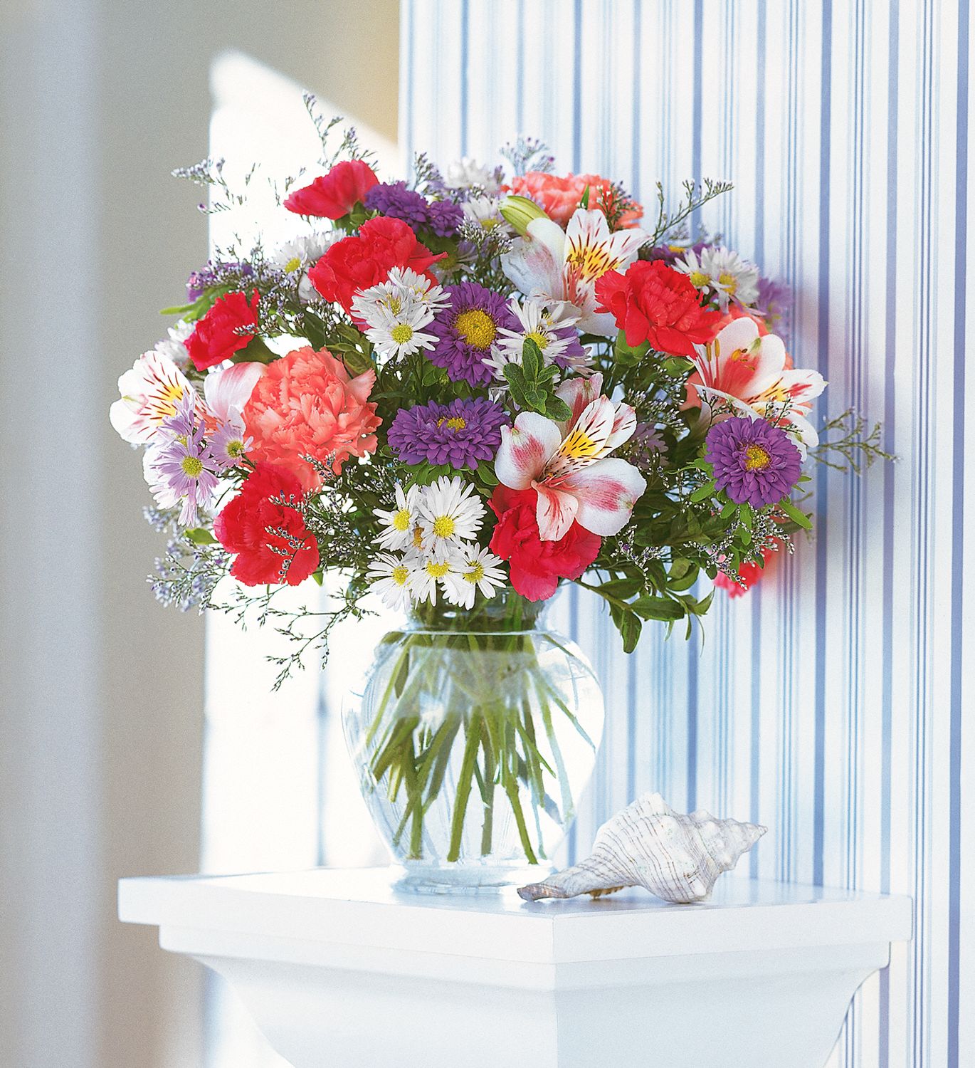 Tell your friends happy birthday with this colorful arrangement by Freytag's.