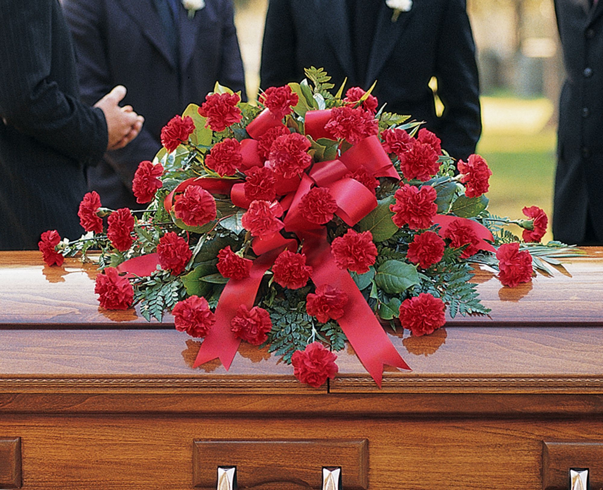 Red Regards Casket Spray Flowers
