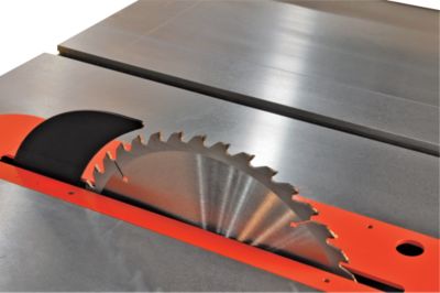 Riving knife maintains close blade proximity to reduce chance of kickback