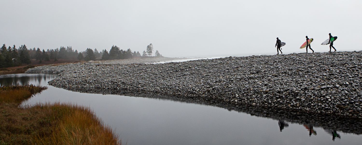 Kevin Schulz, Tommy Coleman and Logan Landry surf October swells in the Maritimes, Nova Scotia.