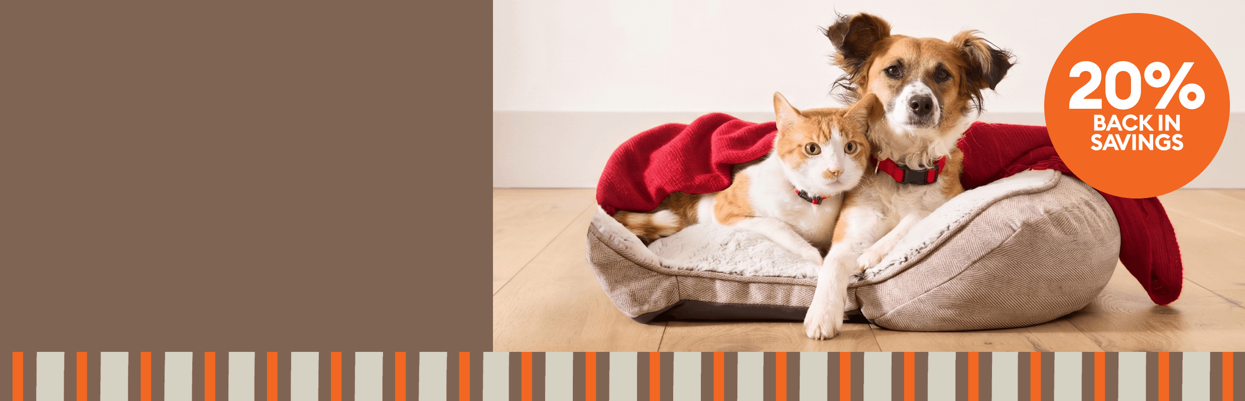 Dog & cat lying together on a bed with a red blanket and a 20% back in savings, Fall Deals Event callout