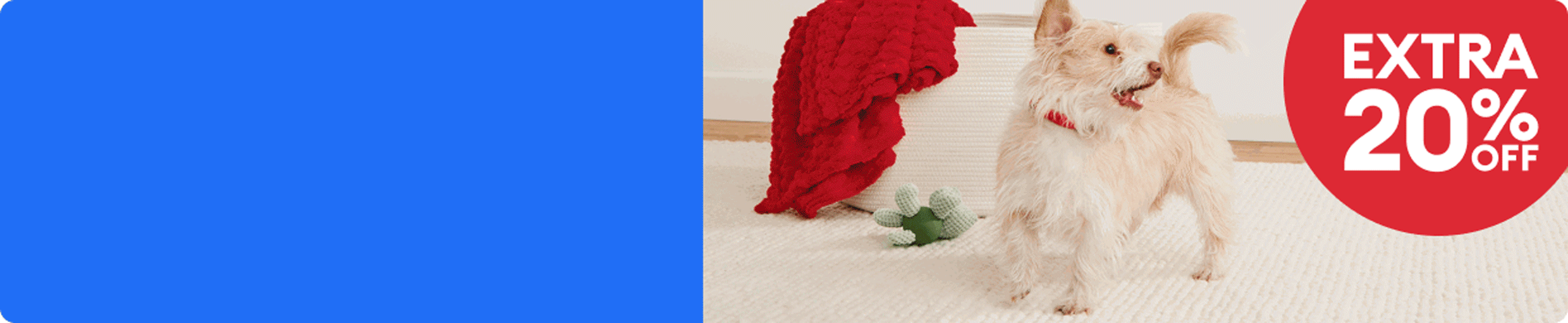 Extra 20% off callout & a dog standing next to a toy & basket with a blanket