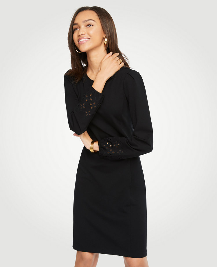 Impeccably tailored, our smooth ponte shift is detailed with a front keyhole and eyelet cuffs for a pretty peek-a-boo effect. Jewel neck with front keyhole and hook-and-eye closure. Long sleeves with pleated sleeve caps and encased elastic cuffs. 20 from natural waist.