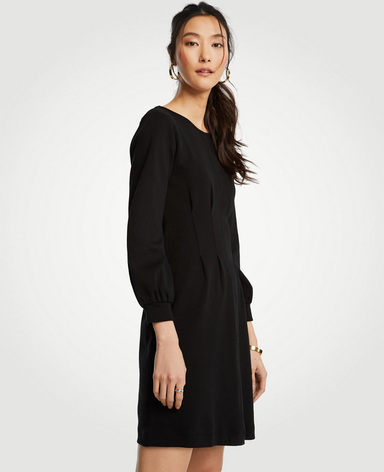 Meet your real-life uniform: this is Luxewear. Every day. Every wear. Ingeniously tailored with corset-inspired pleats at the bodice, this rich doubleface style is a modern mix of sporty and sweet. Jewel neck. Long sleeves with shirred cuffs. Waist pleats. Hidden back zipper with hook-and-eye closure. 19 from natural waist.