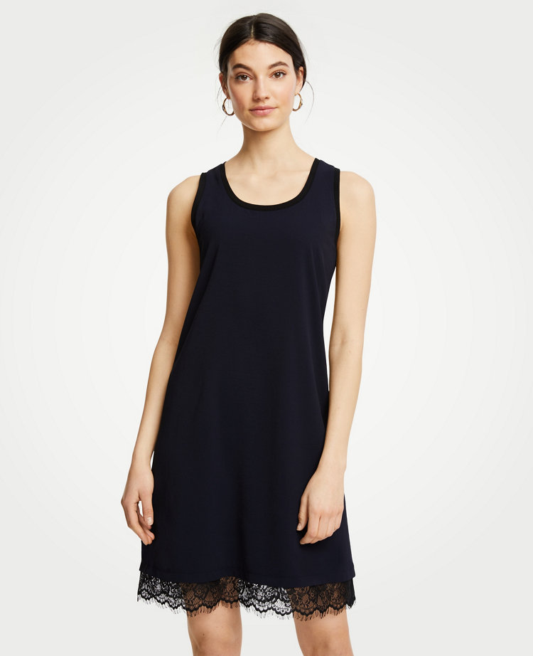 Meet your real-life uniform: this is Luxewear. Every day. Every wear. In a soft and stretchy knit, this easy tank dress gets a major upgrade from a feathery lace hem. Scoop neck. Sleeveless. 20 1/2 from natural waist.