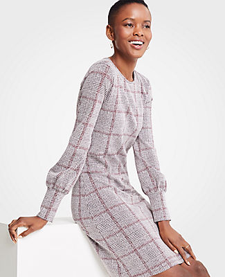 Meet your real-life uniform: this is Luxewear. Every day. Every wear. Give yourself a check plus with our soft plaid dress, highlighted with smartly cuffed sleeves. Jewel neck. Long sleeves with shirred cuffs. Hidden back zipper with hook-and-eye closure.
