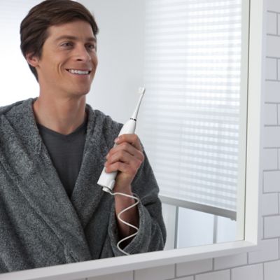 electric toothbrush with built in waterpik