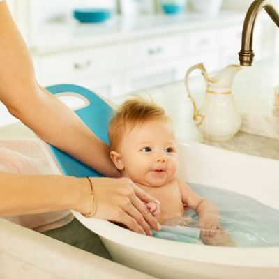 munchkin sit & soak infant bath tub