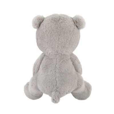 grey teddy bear with patches