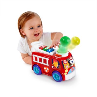 bright starts roll & pop train toy