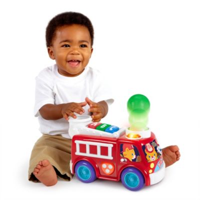 bright starts roll & pop train toy