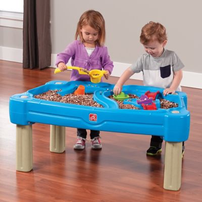 step2 cascading cove sand and water table with cover and umbrella