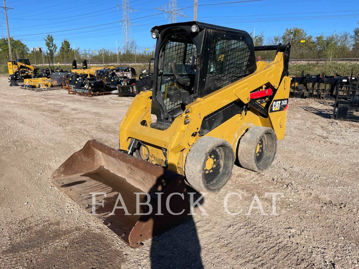 Photo of a  Caterpillar 242D C3H2