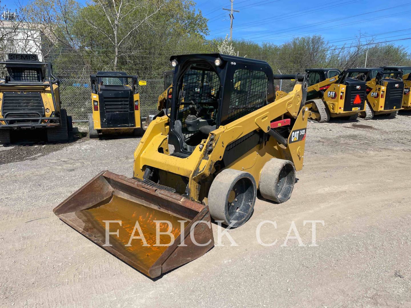 Photo of a  Caterpillar 242D C3H2