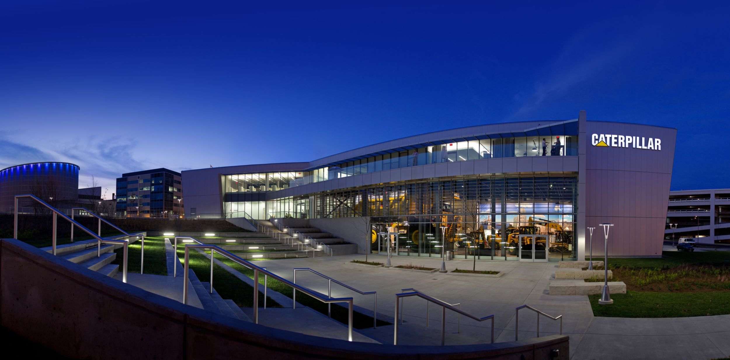 Outside of Caterpillar Visitors Center at night