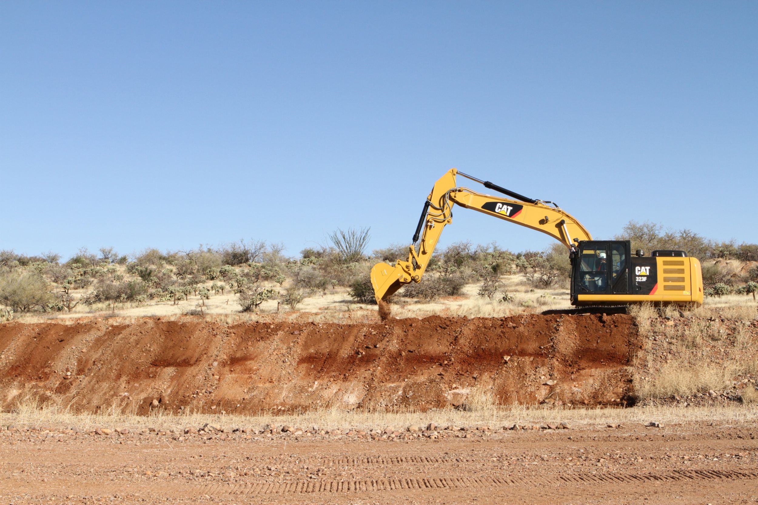 Grading work with a Clean-up Bucket