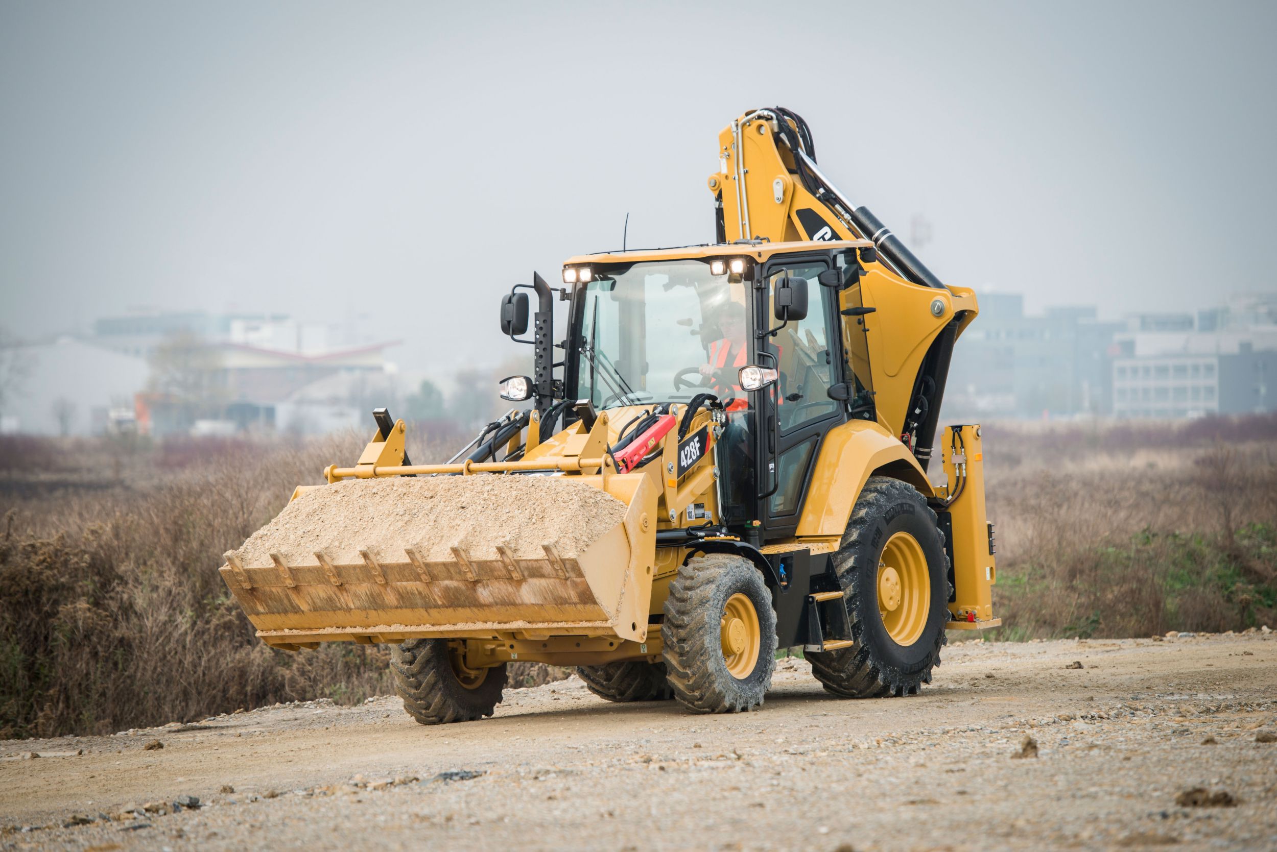 Ищу работа погрузчик экскаватор. Caterpillar 428f2. Экскаватор-погрузчик Caterpillar 428. Катерпиллер 428f. Экскаватор погрузчик Катерпиллер 428f.