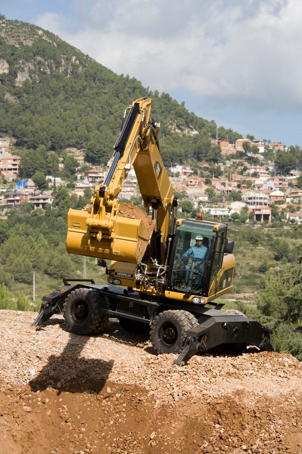 Колёсный экскаватор CAT M322D