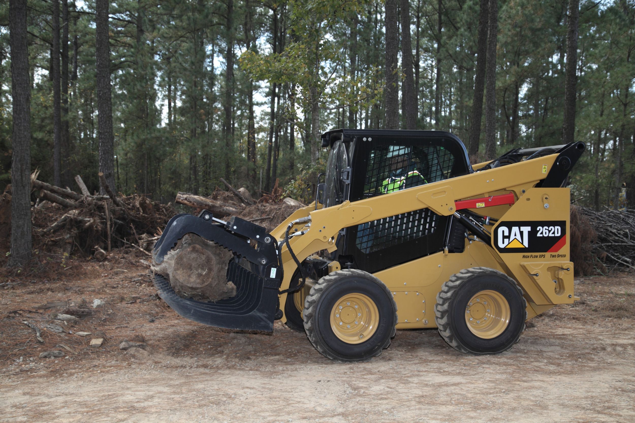 Cat 262D Skid Steer Loader with Grapple Attachment