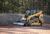 Cat® 289D Compact Track Loader and LT18B Landscape Tiller at Work