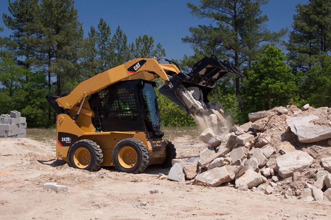 Cat 242B3 Skid Steer Loader with Grapple Attachment