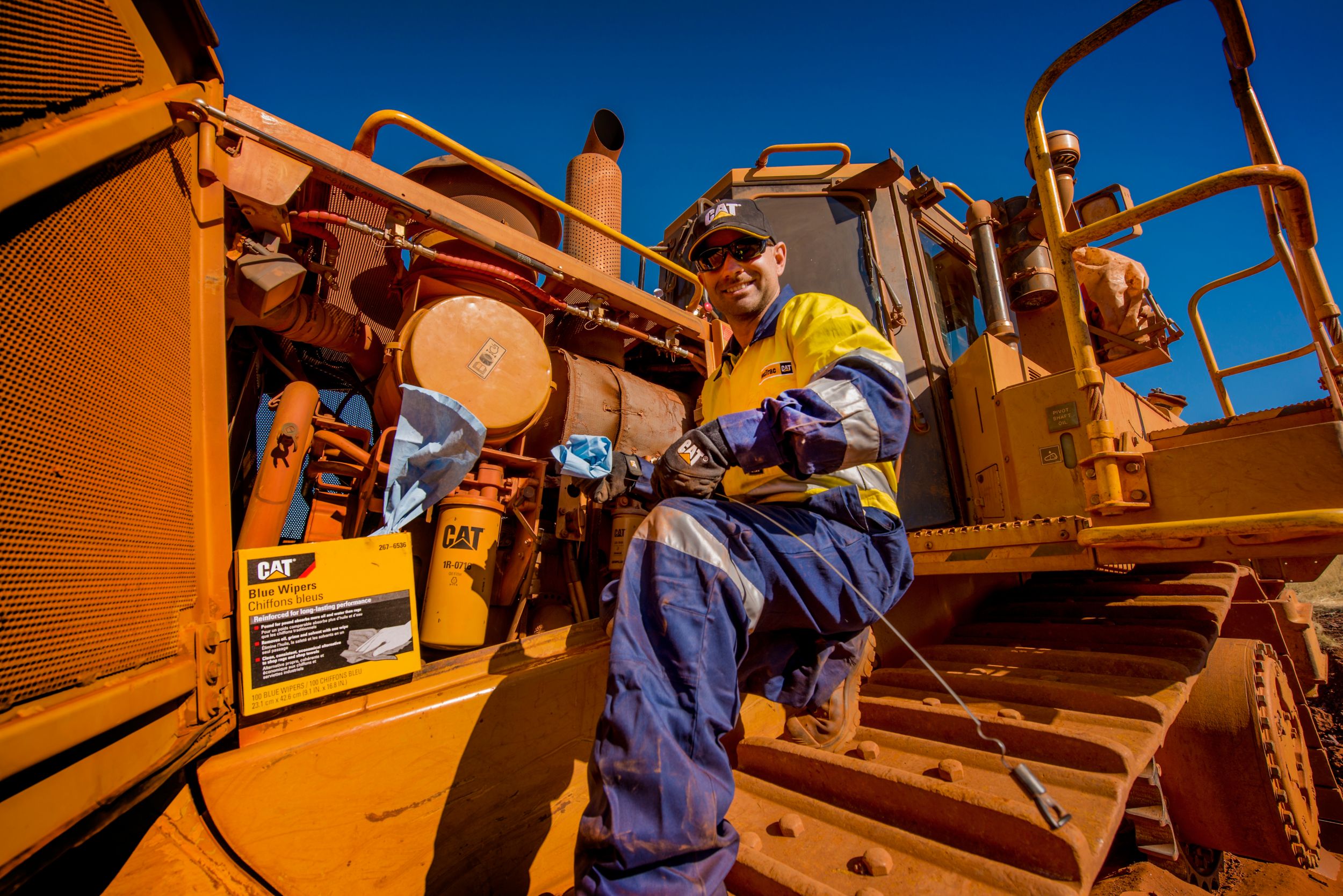 Customer on jobsites with excavator and articulated truck