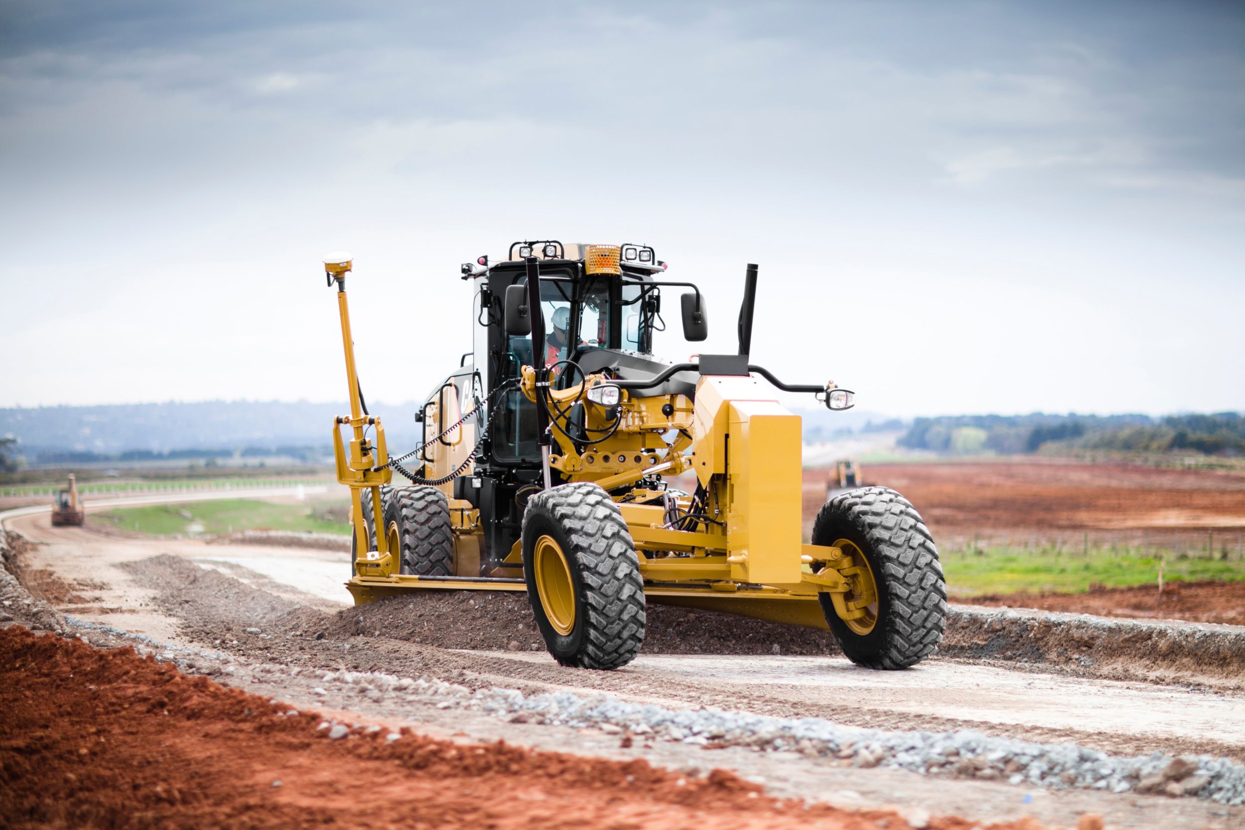 150 (140M) Motor Grader maintaining roads