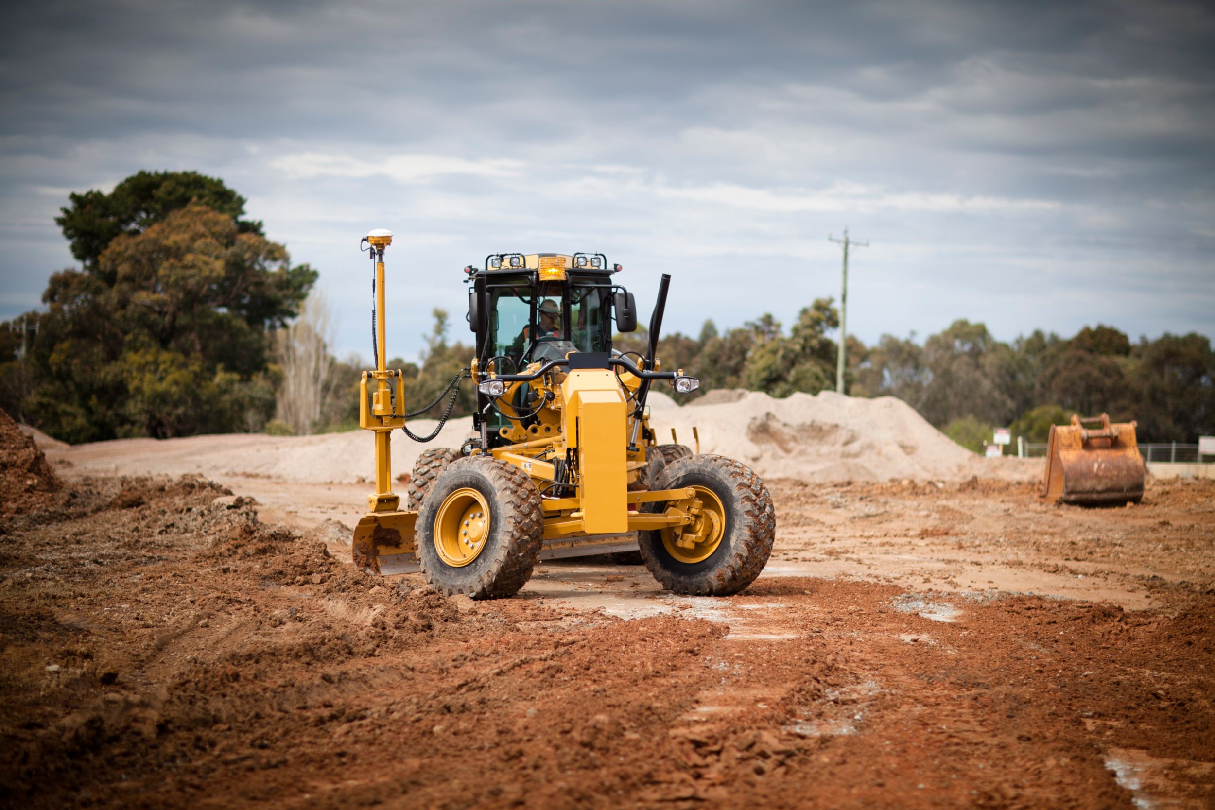 140 grader working on site prep