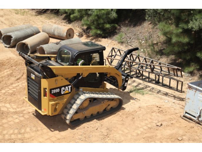 Cat® 289D Compact Track Loader and Material Handling Arm Moving Metal Structures