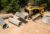 Cat® 289D Compact Track Loader and Material Handling Arm Moving Pipe