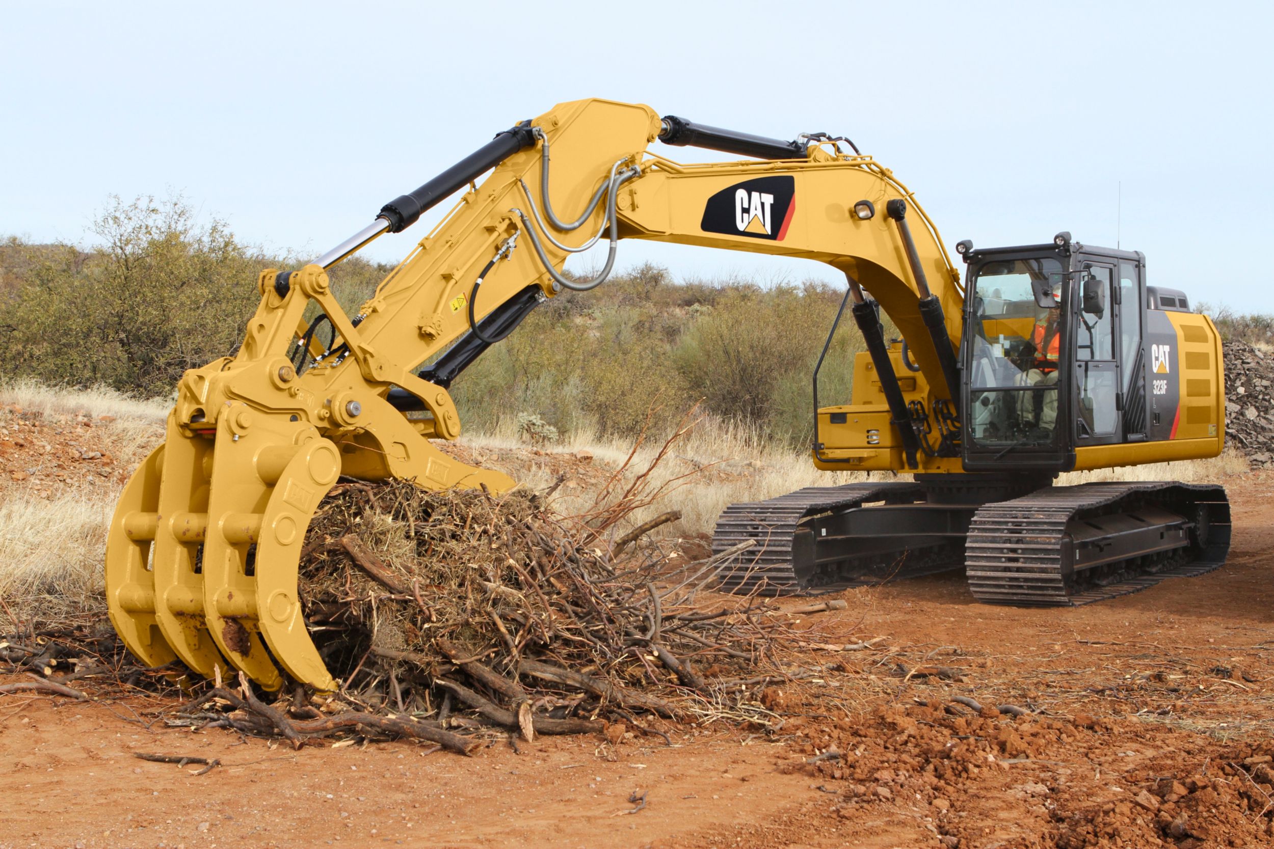 Pin Grabber Coupler clearing brush with rake and Pro Plus thumb