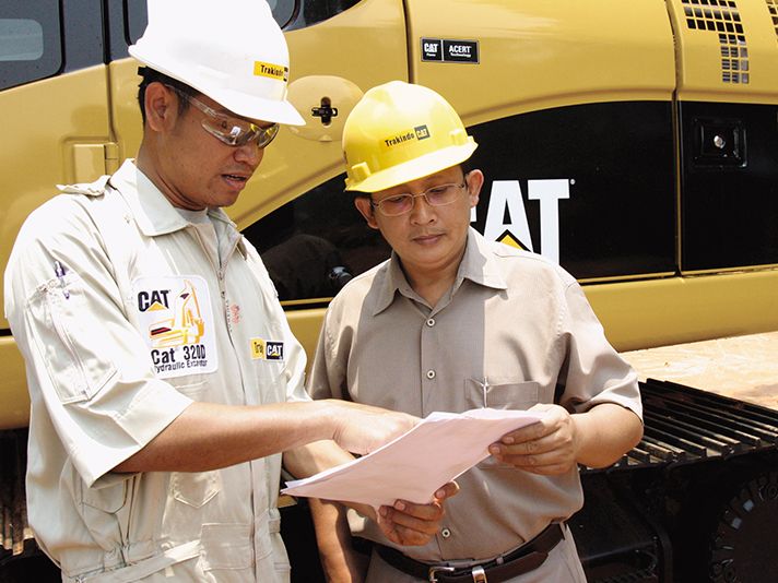 Cat dealer parts and service team member