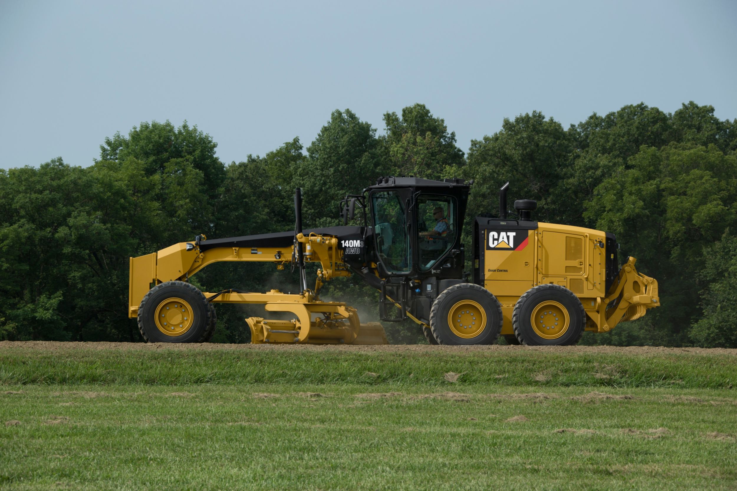 Cat Grade avec pente transversale pour niveleuses