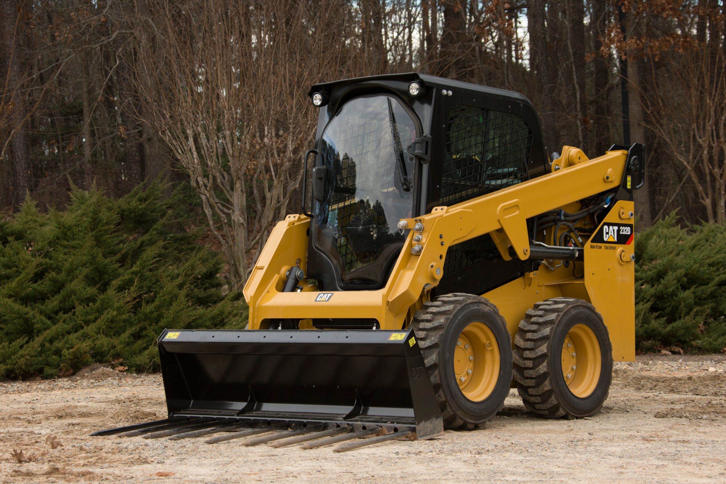 product-Utility Forks on a D-Series Skid Steer Loader