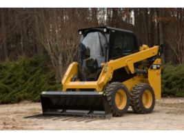 Utility Forks on a D-Series Skid Steer Loader