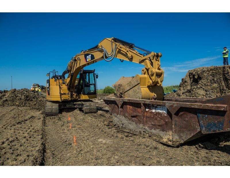 325F CR using a Heavy Duty Bucket