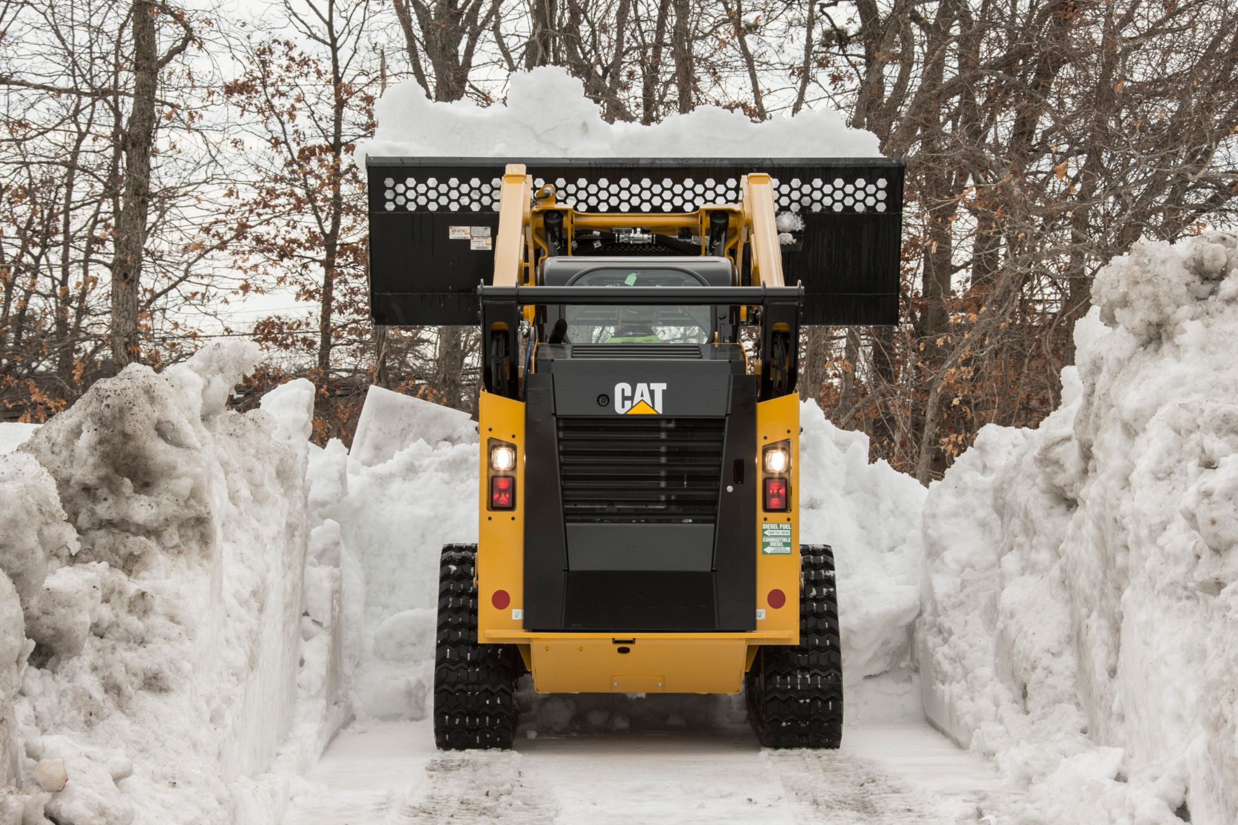 product-Skid Steer Loader Material Handling Bucket - Dumping Snow