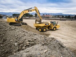 336F Excavator loading a 730C Articulated Truck with a General Duty Bucket