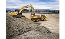 336F Excavator loading a 730C Articulated Truck with a General Duty Bucket