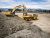 336F Excavator loading a 730C Articulated Truck with a General Duty Bucket