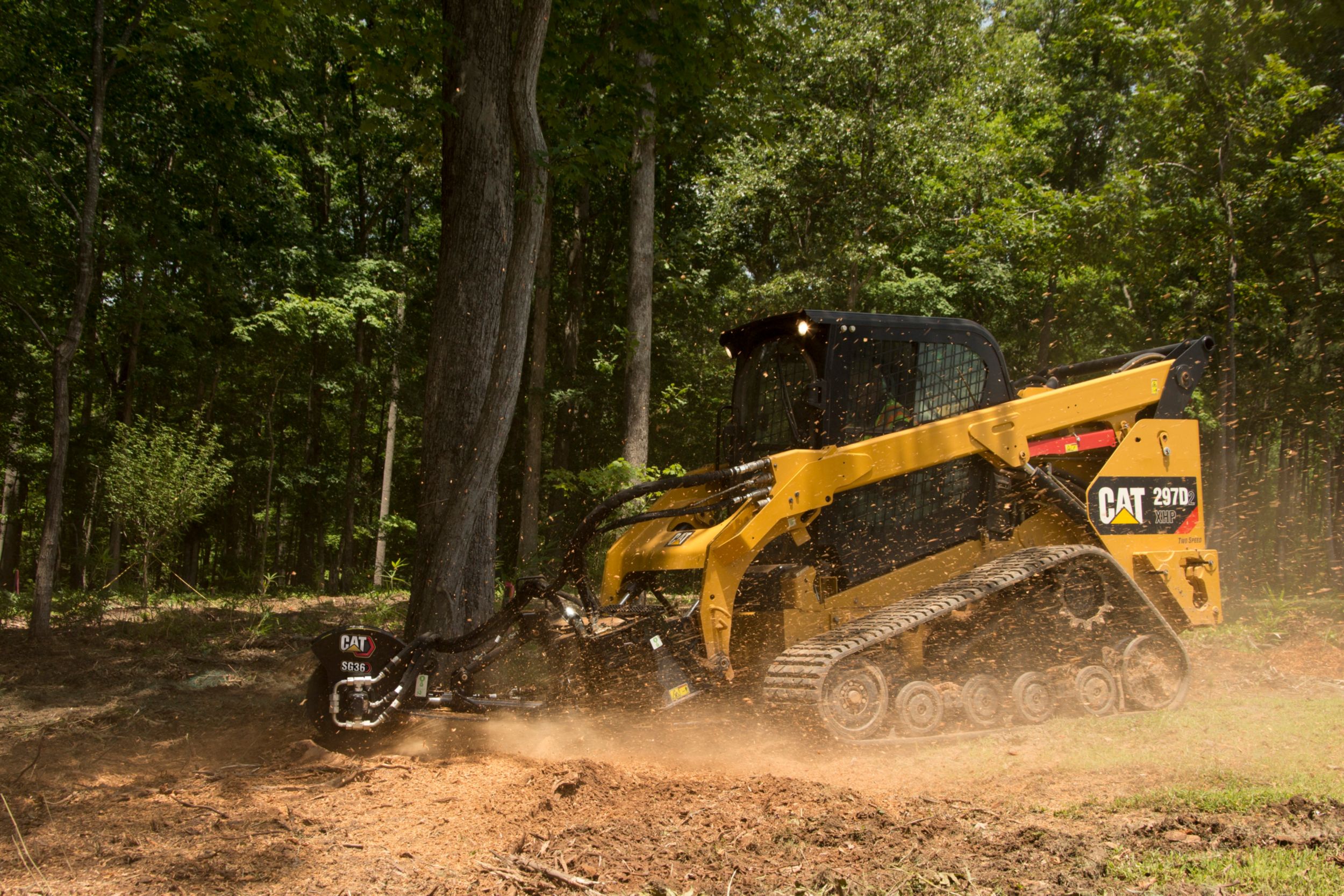 Cat® 297D2 and SG18B Stump Grinder at Work>