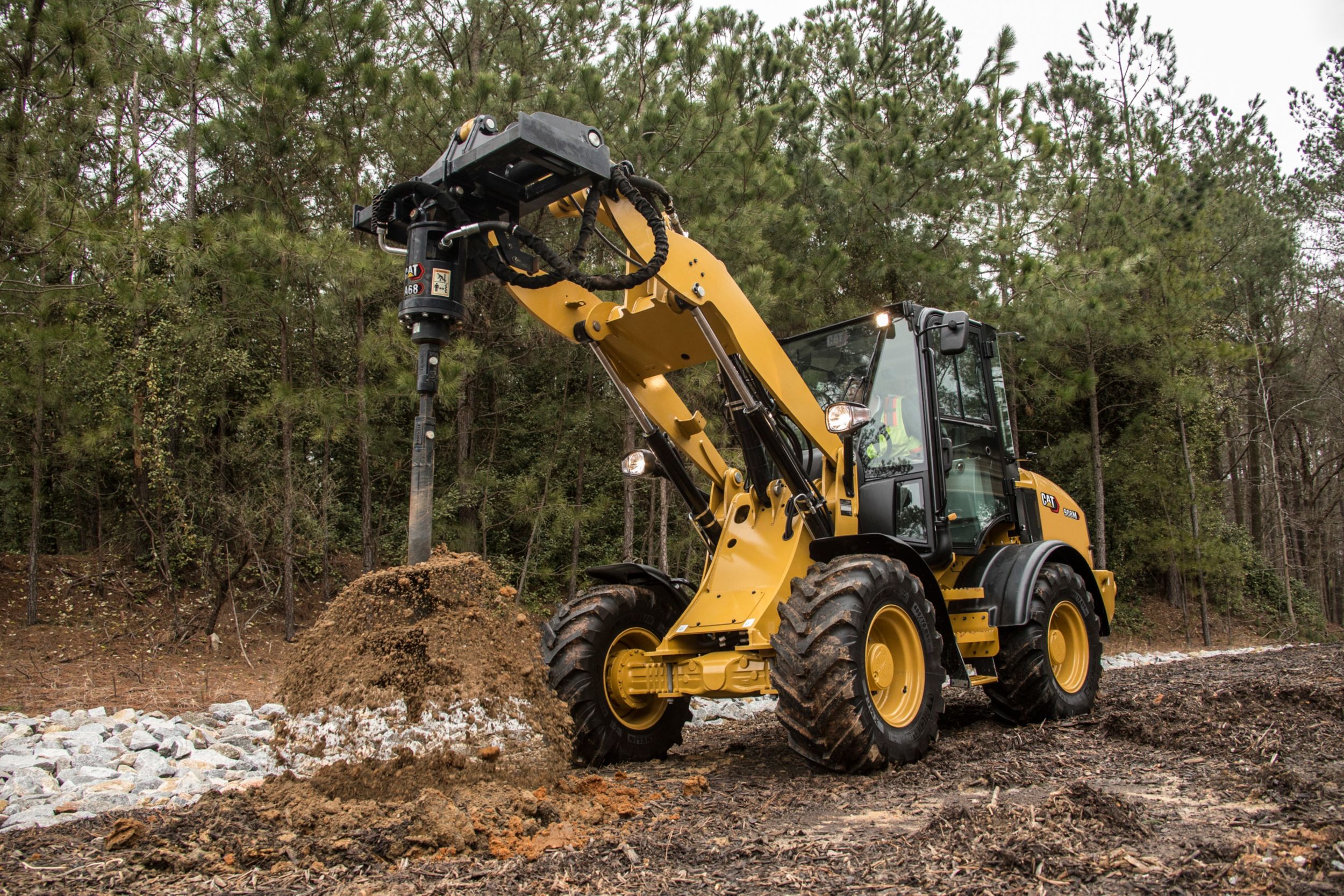 compact wheel loader brush attachment