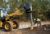 Customer using Cat® Mixing Bucket hose to direct mix right where you need it.