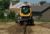 Cat® 259D Compact Track Loader and T9B Trencher Attachment Digging a Trench