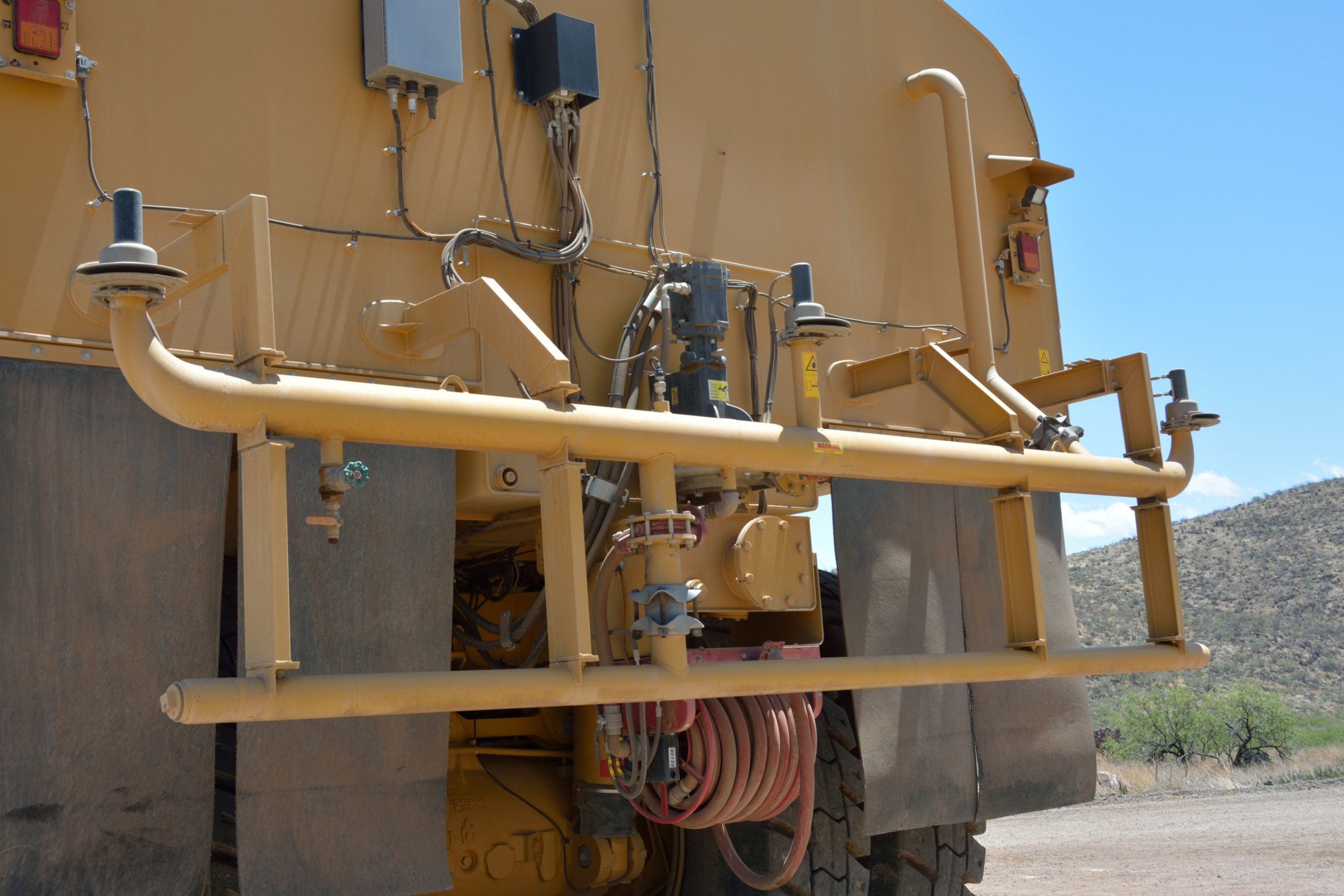 Water Delivery System spray bar view on a water truck at the Tuscon Proving Ground (TPG)>