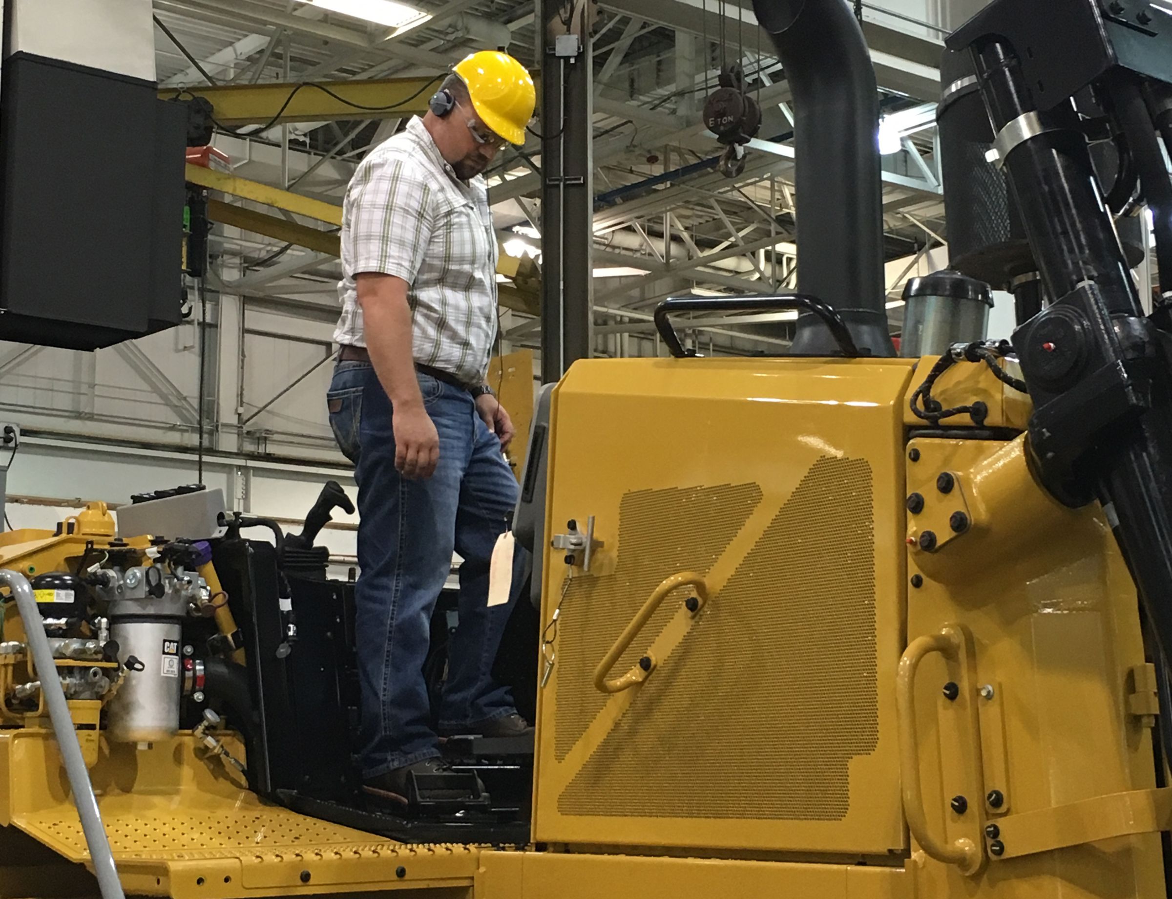 Levi Higdon, Regional Manager for Santek Environmental, got to start up Santek’s new Cat® D6T on the tour.