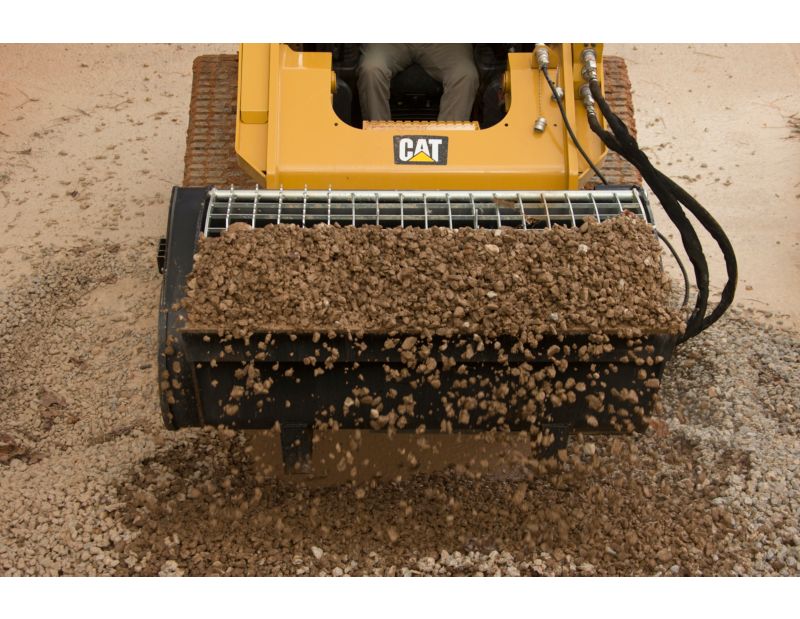 Cat® Mixing Bucket Scooping Rock