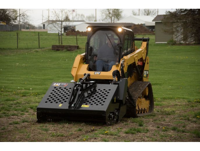 Cat® Landscape Rake on a 259D Compact Track Loader