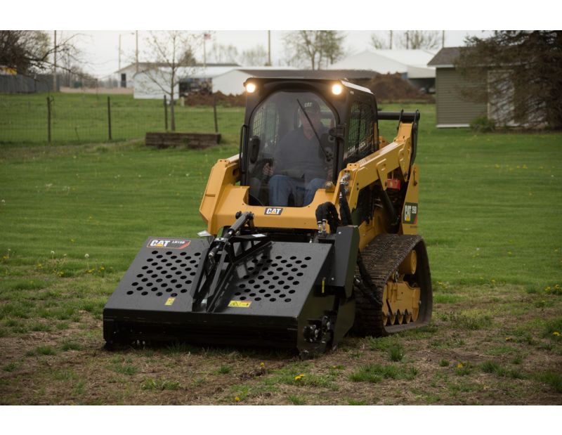 Cat® Landscape Rake on a 259D Compact Track Loader